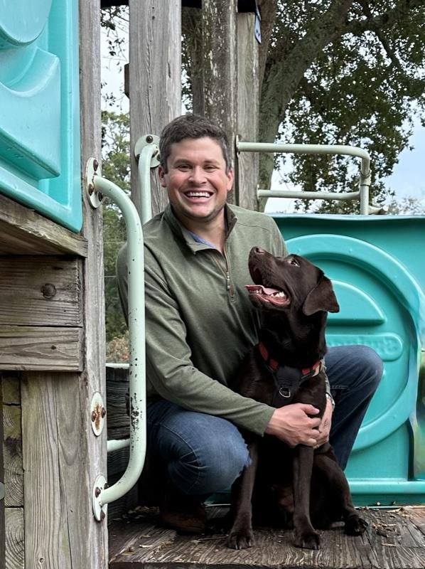 Matt with his chocolate lab